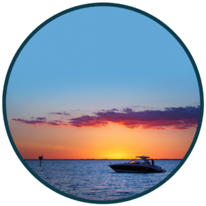 boater on the water at sunset