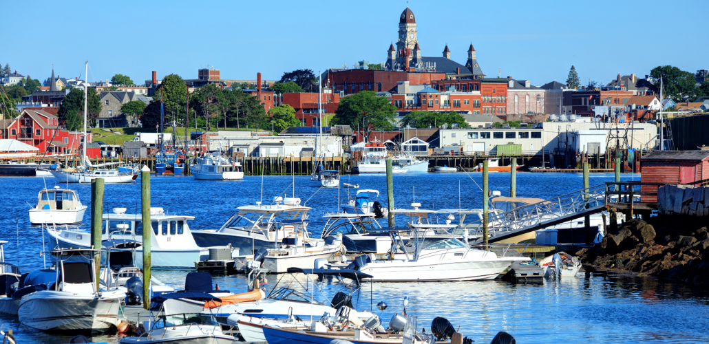 several boats docks and moored in a harbor of private dock rentals near gloucester ma